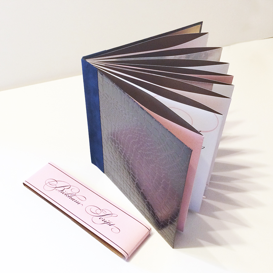 cover, belly band and gold inner pages